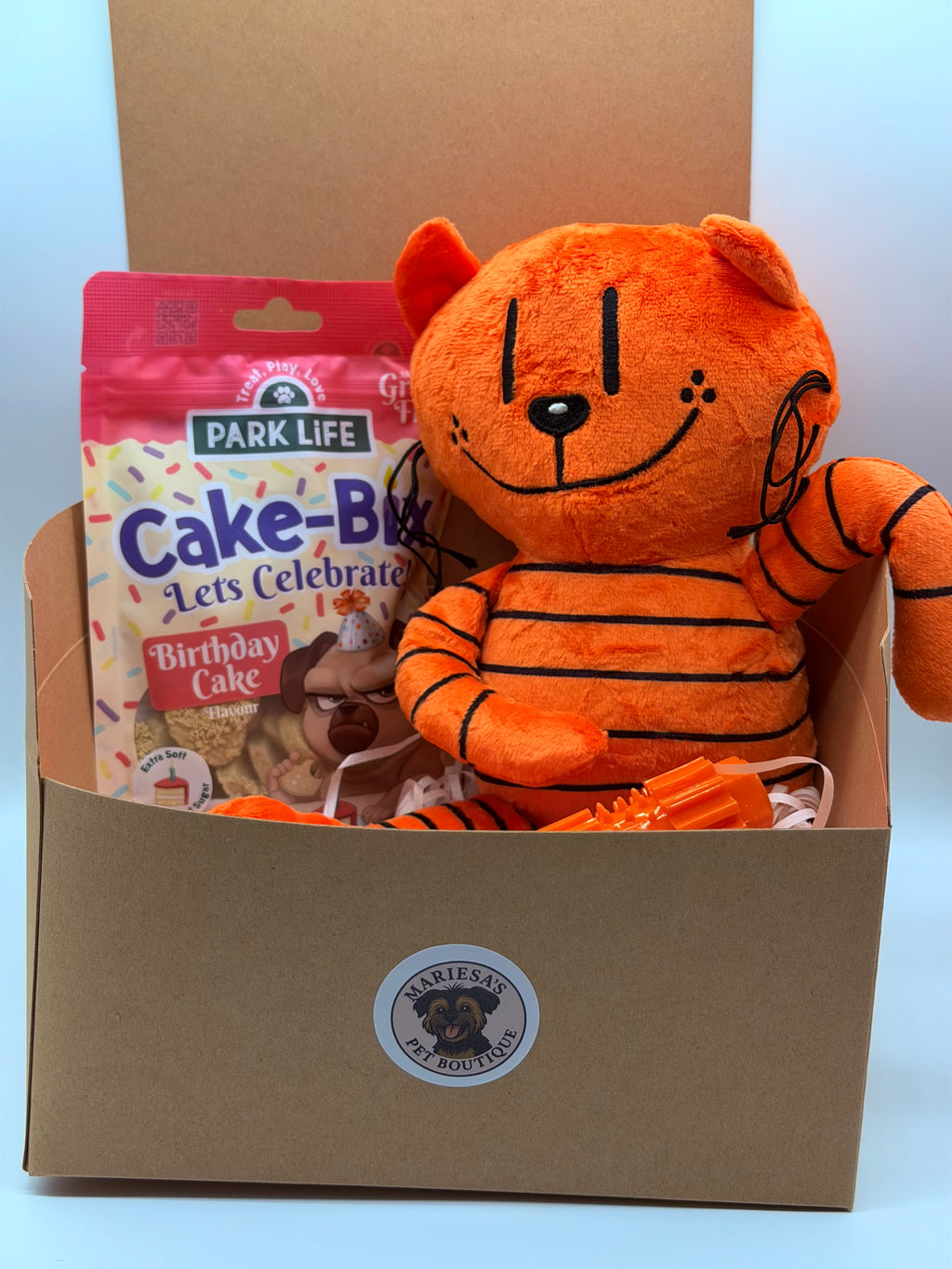 Dog personalised birthday box with treats, soft toy and dog chew