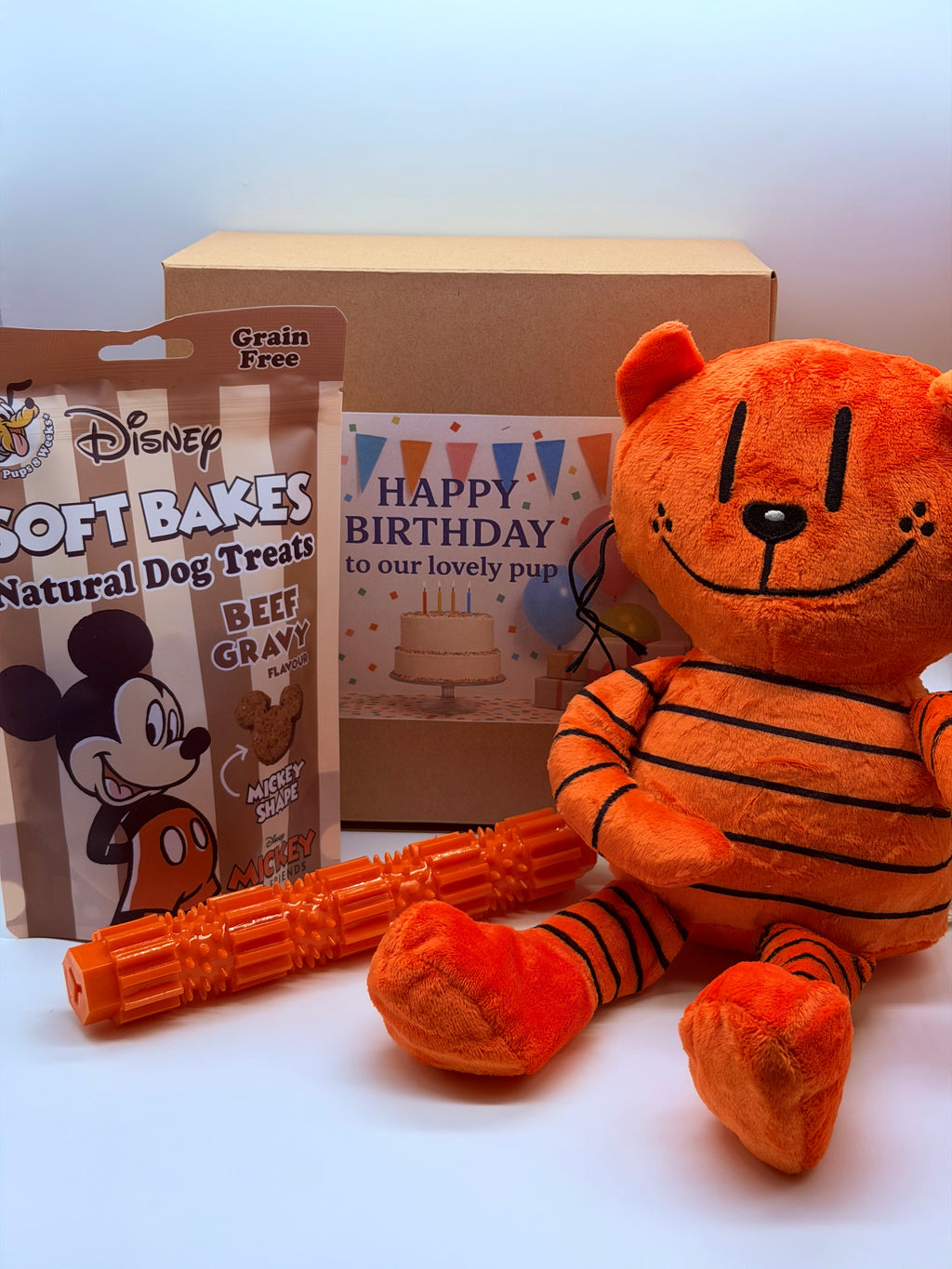 Dog personalised birthday box with treats, soft toy and dog chew