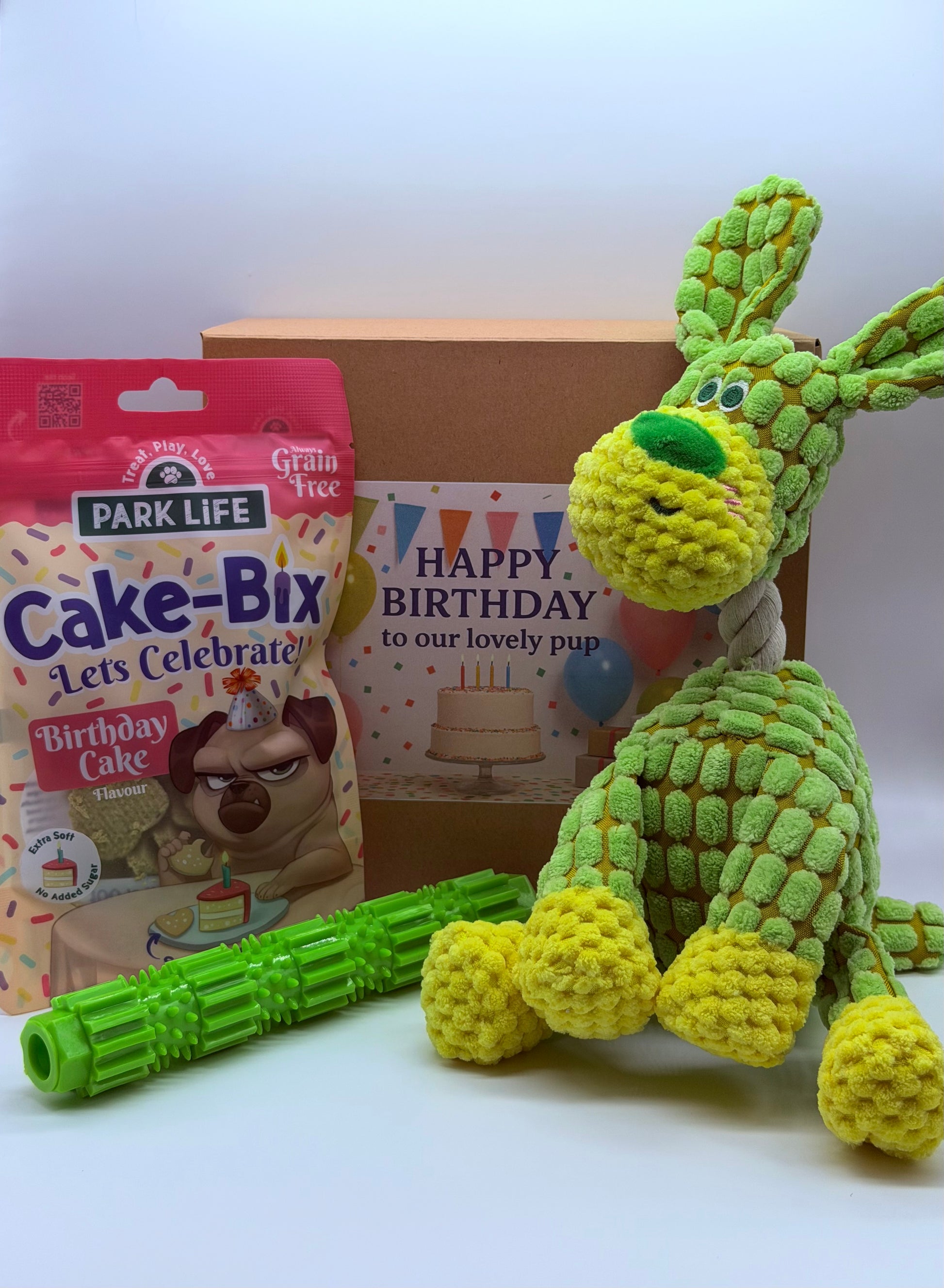 Dog personalised birthday box with treats, soft toy and dog chew