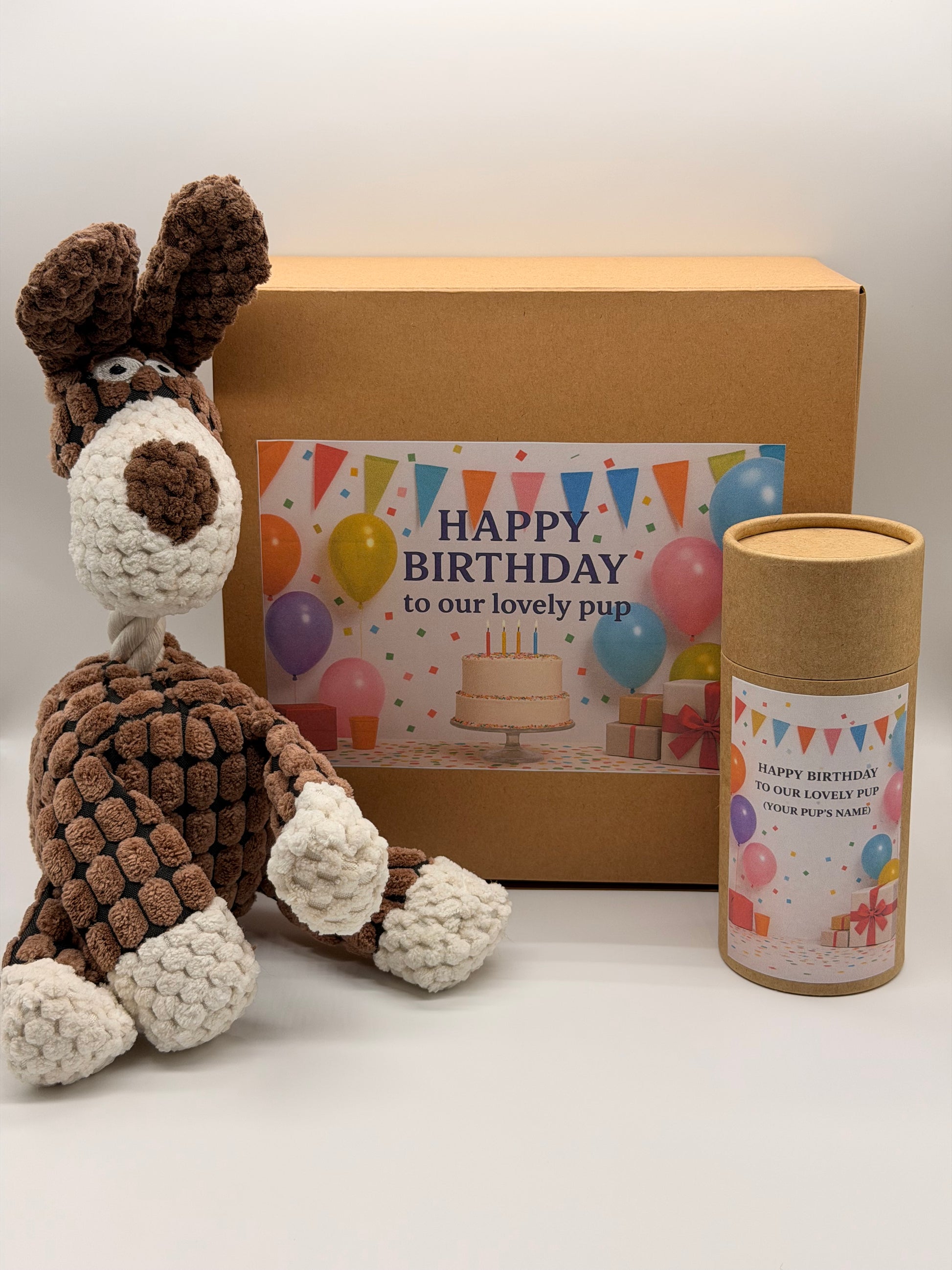 Personalised dog birthday box with treats and a soft toy of your choice