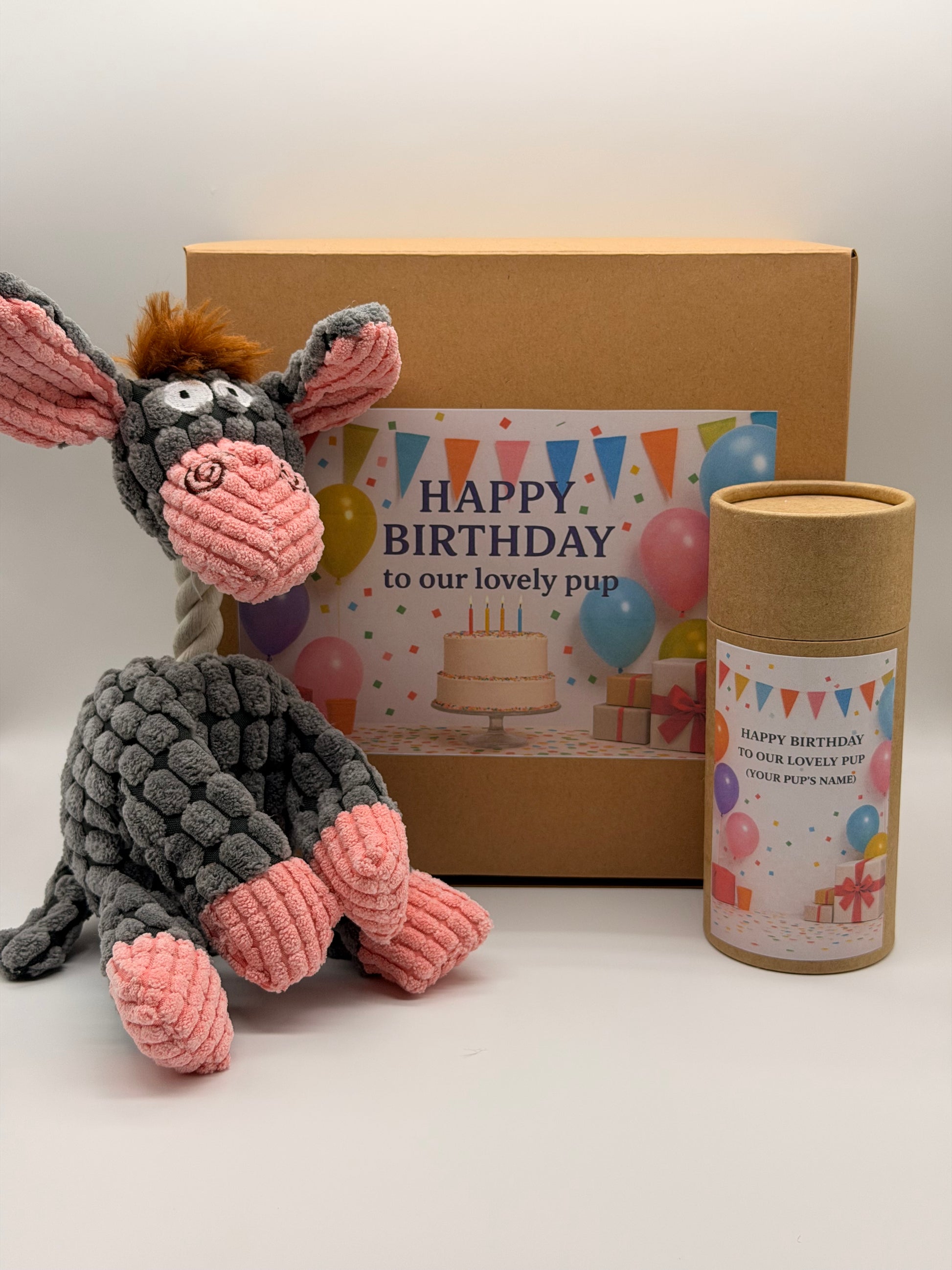 Personalised dog birthday box with treats and a soft toy of your choice