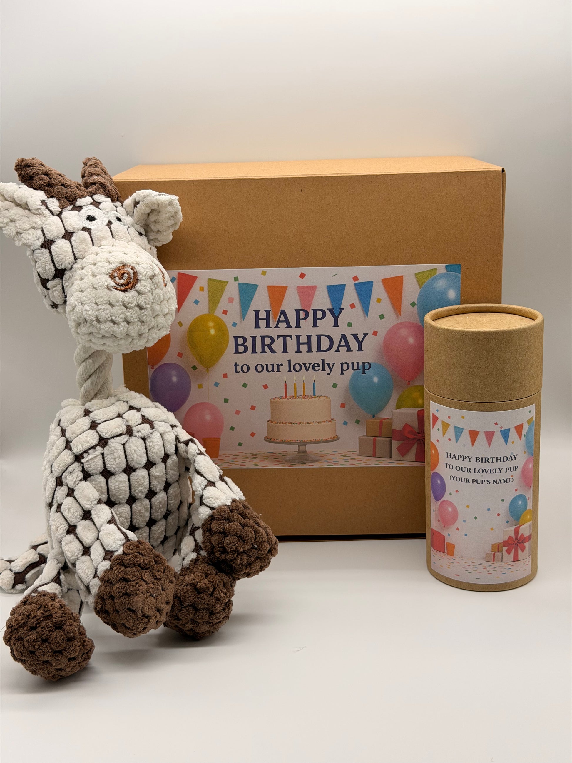 Personalised dog birthday box with treats and a soft toy of your choice