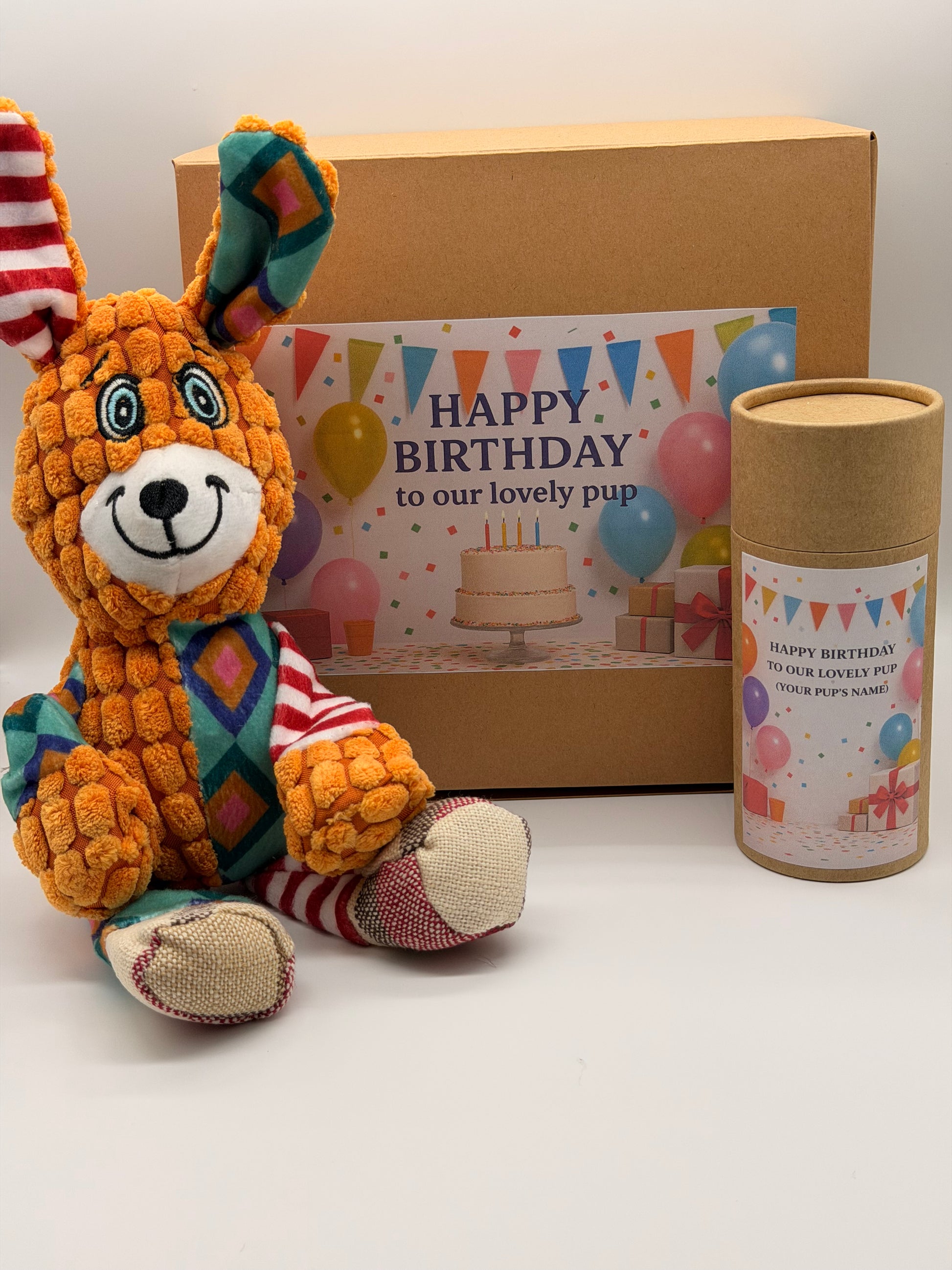 Personalised dog birthday box with treats and a soft toy of your choice
