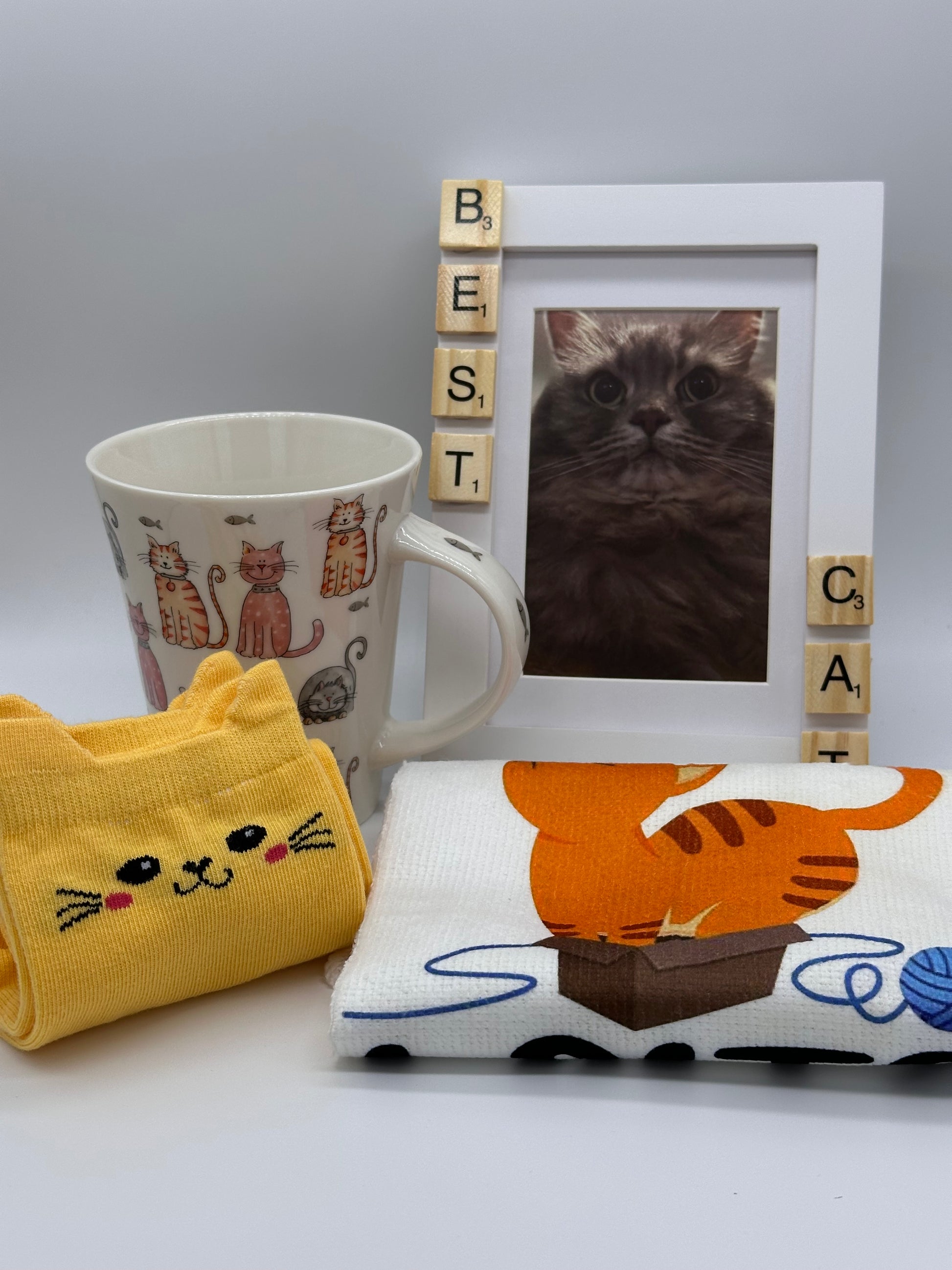 Cat Lover’s Gift Set with wooden photo frame, cat mug, cat tea towel and cat socks