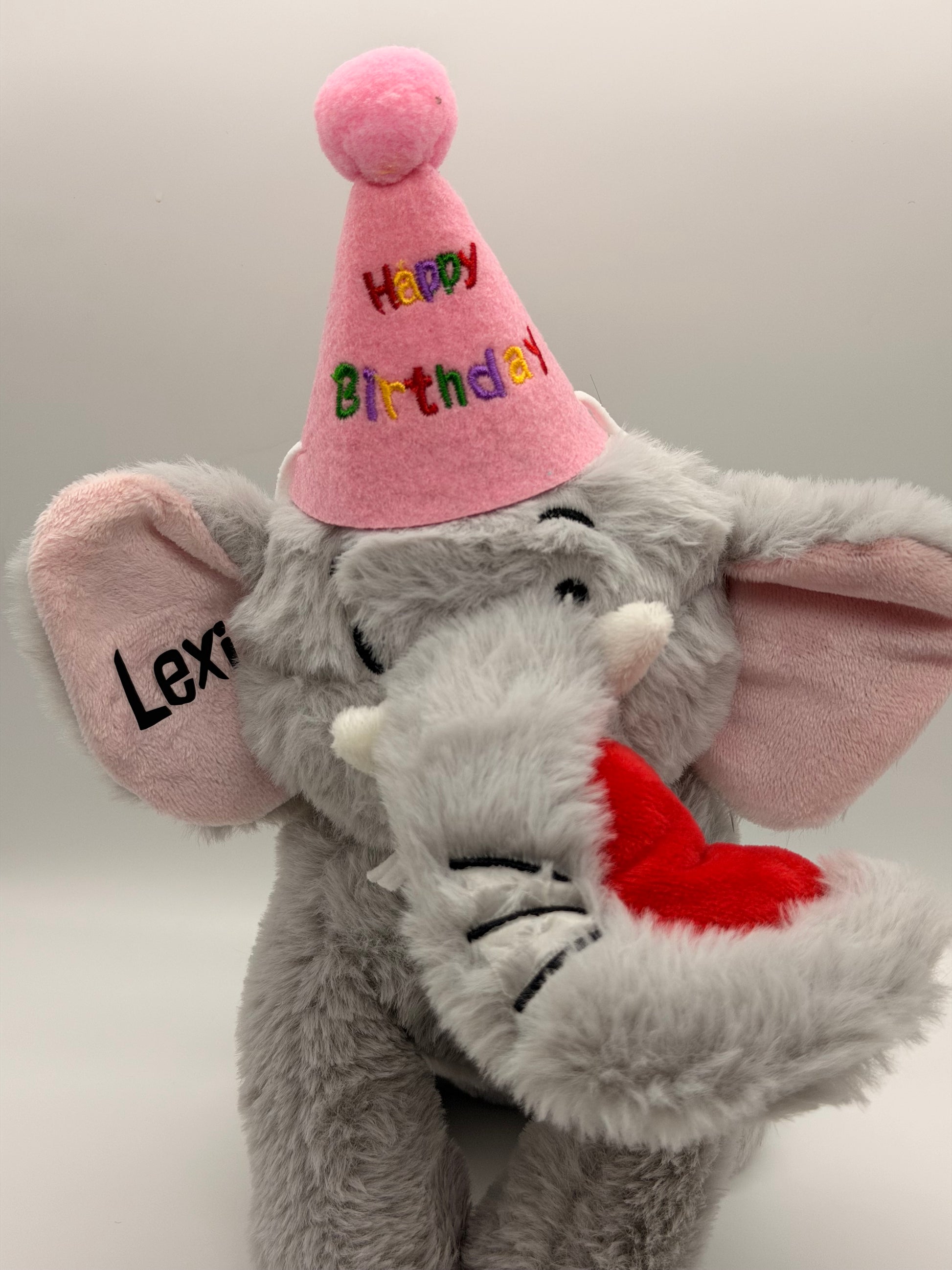 Personalised elephant dog toy with happy birthday hat