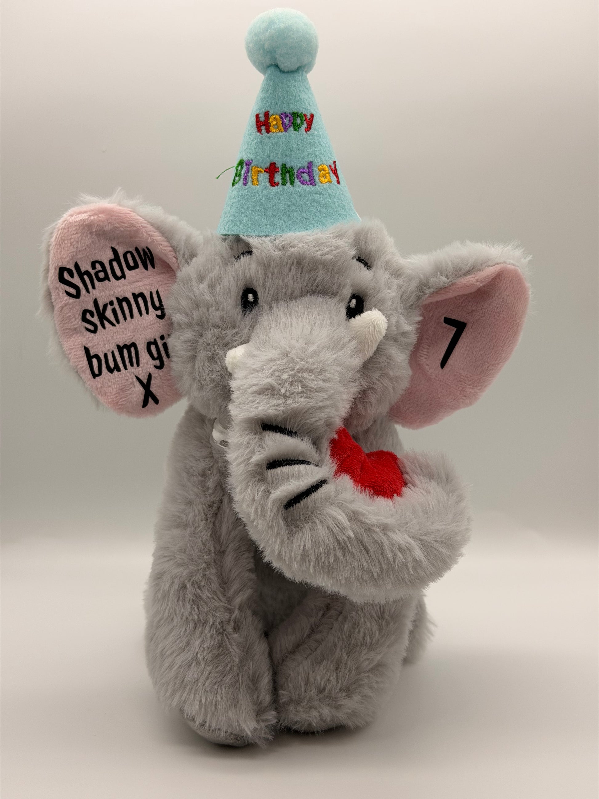 Personalised elephant dog toy with happy birthday hat