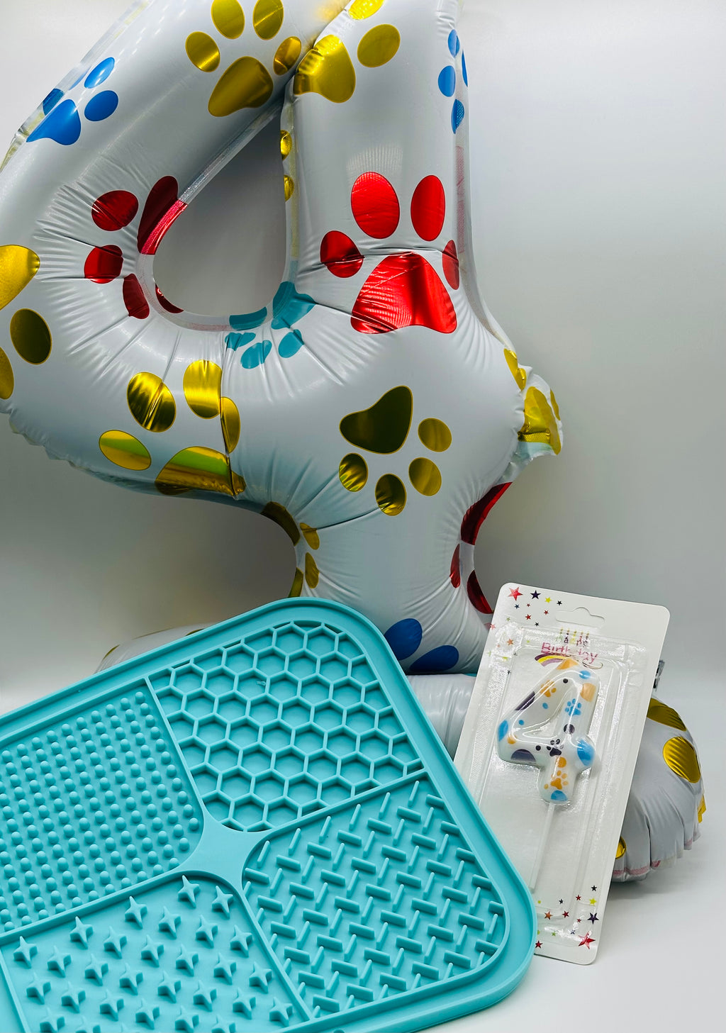 Pet birthday balloon, candle and lick mat
