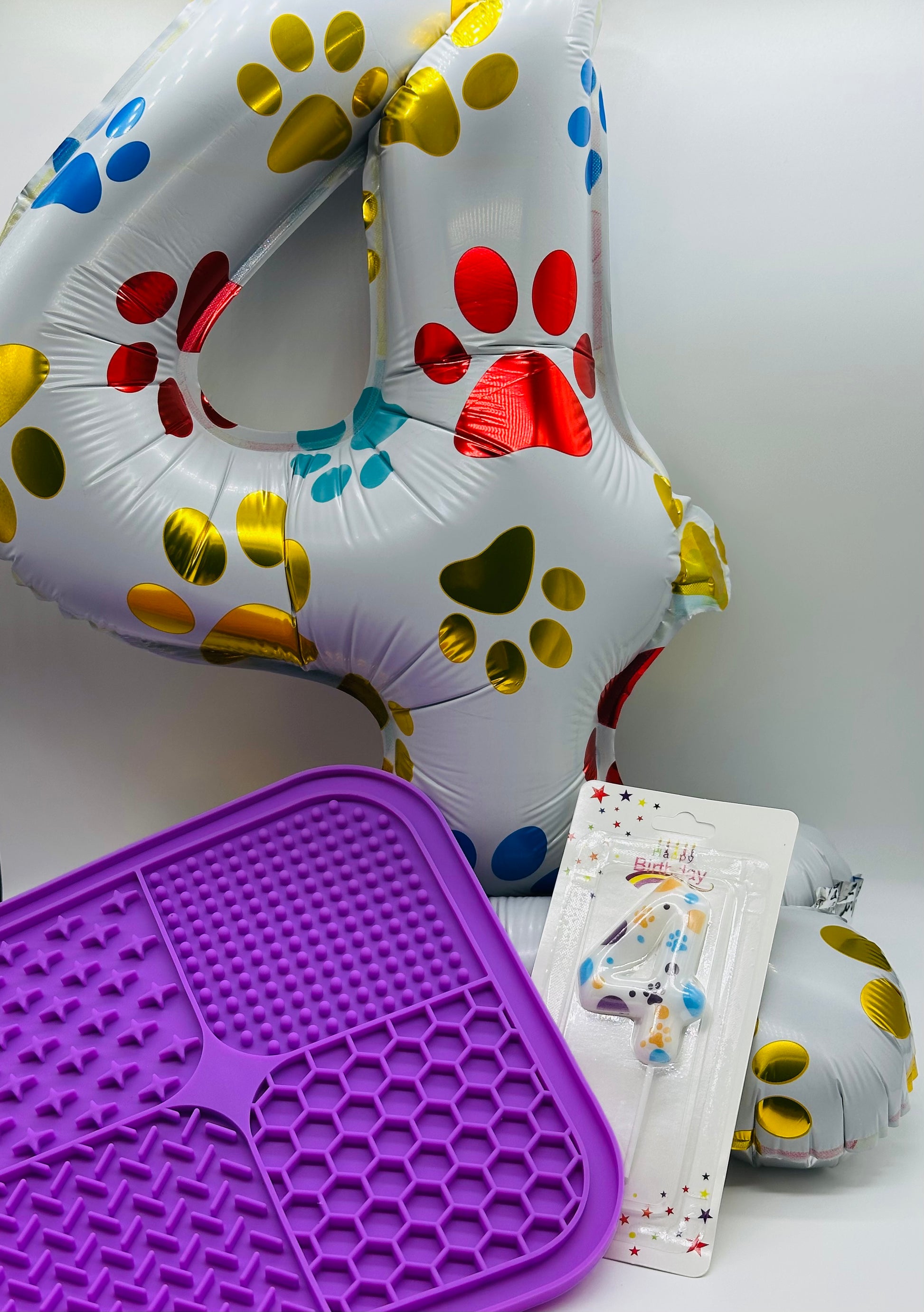 Pet birthday balloon, candle and lick mat