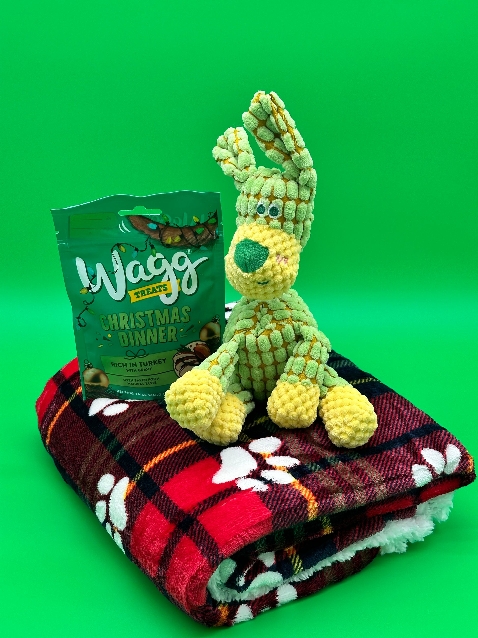 Dog Christmas gift set with warm blanket, soft toy and treats
