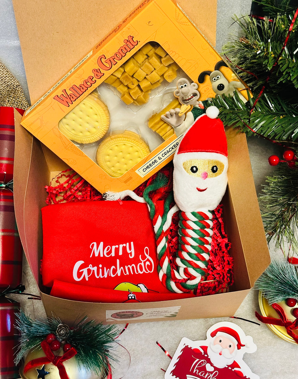 Dog Personalised Christmas box with a Santa rope toy, Christmas bandana and treats