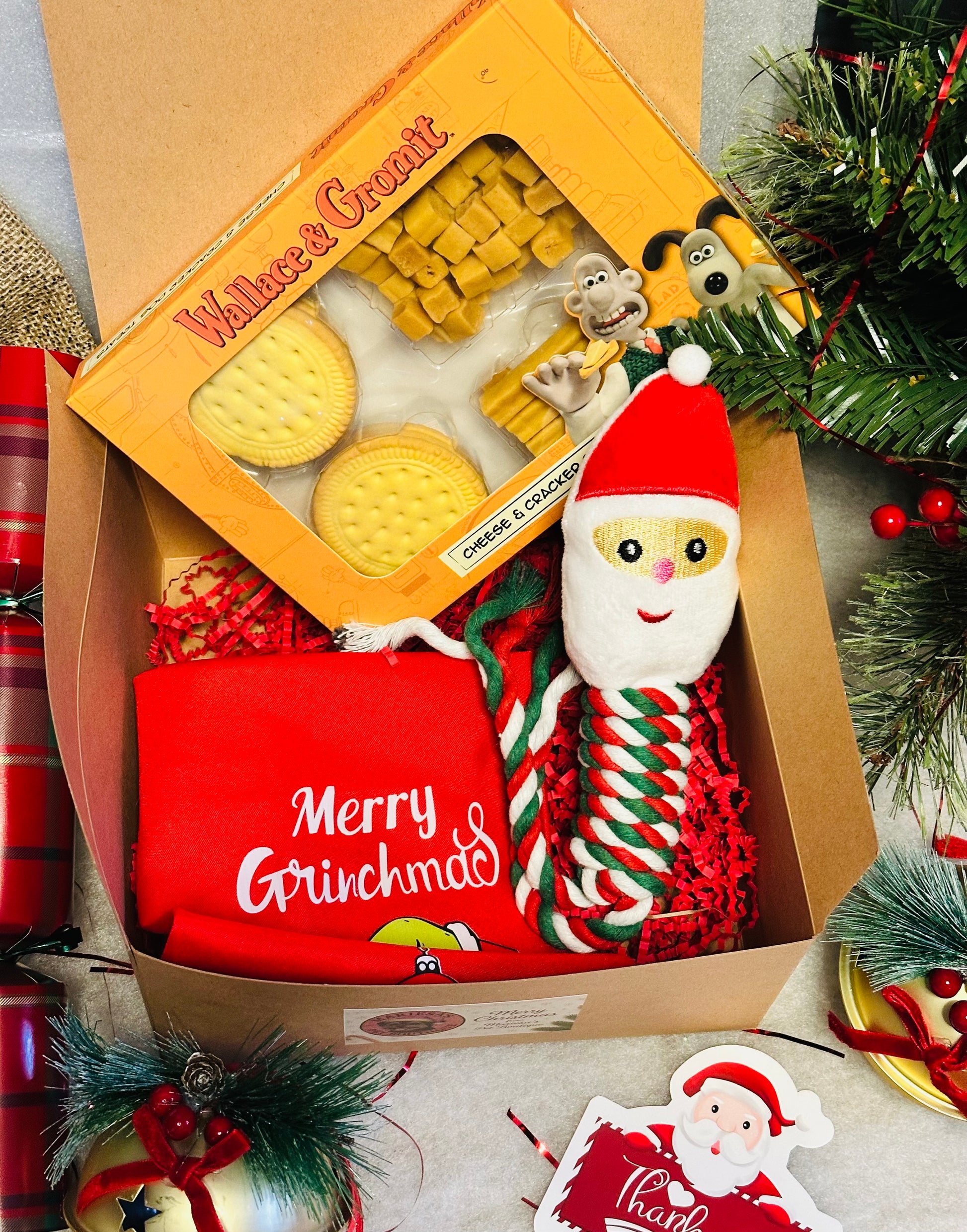 Dog Personalised Christmas box with a Santa rope toy, Christmas bandana and treats
