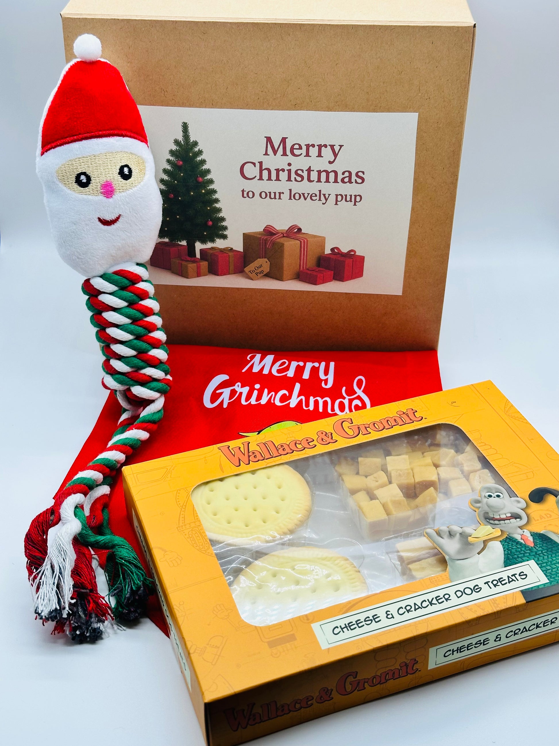 Dog Personalised Christmas box with a Santa rope toy, Christmas bandana and treats