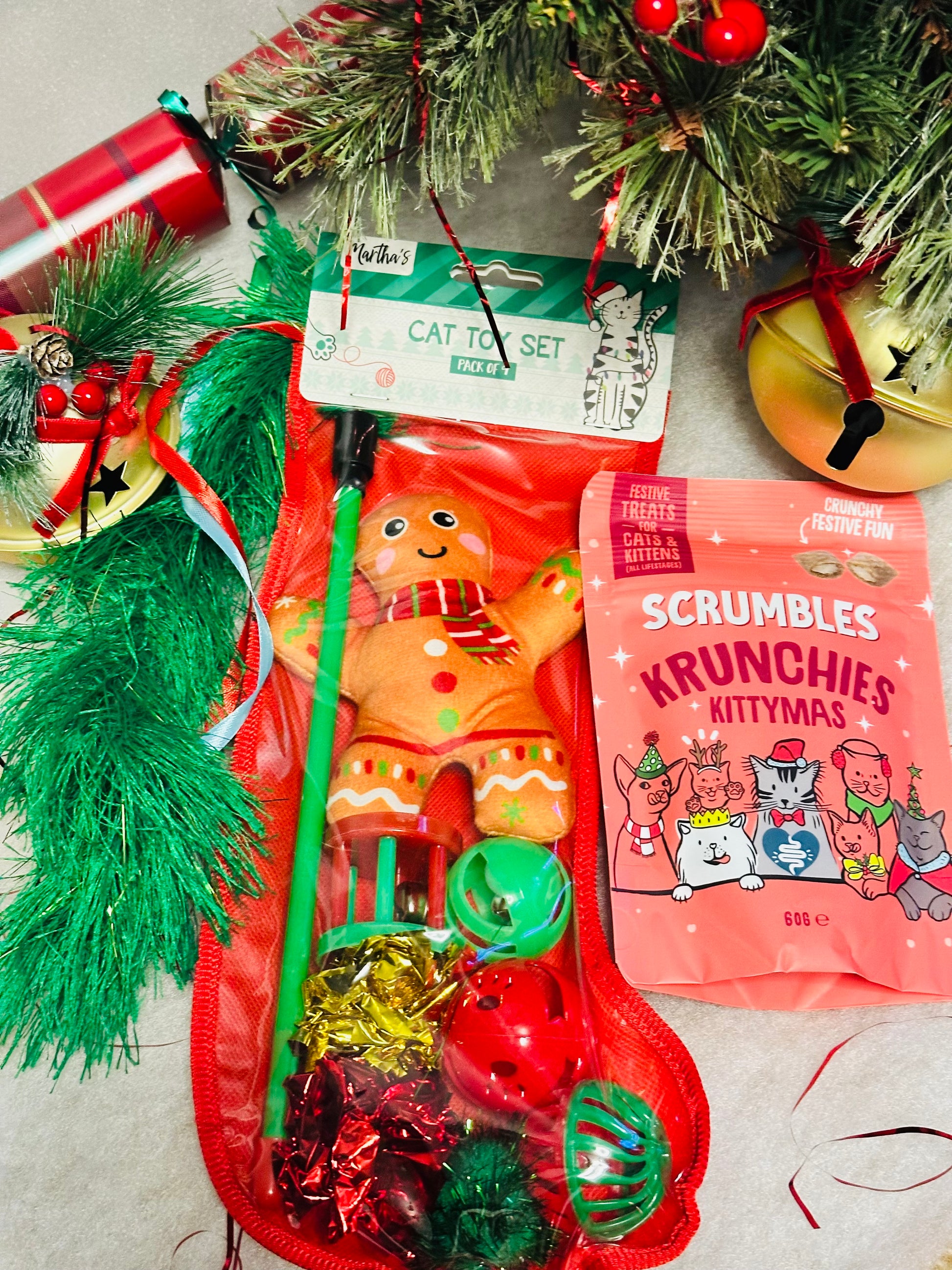 Cat Christmas Stocking with interactive toys and a treat bag