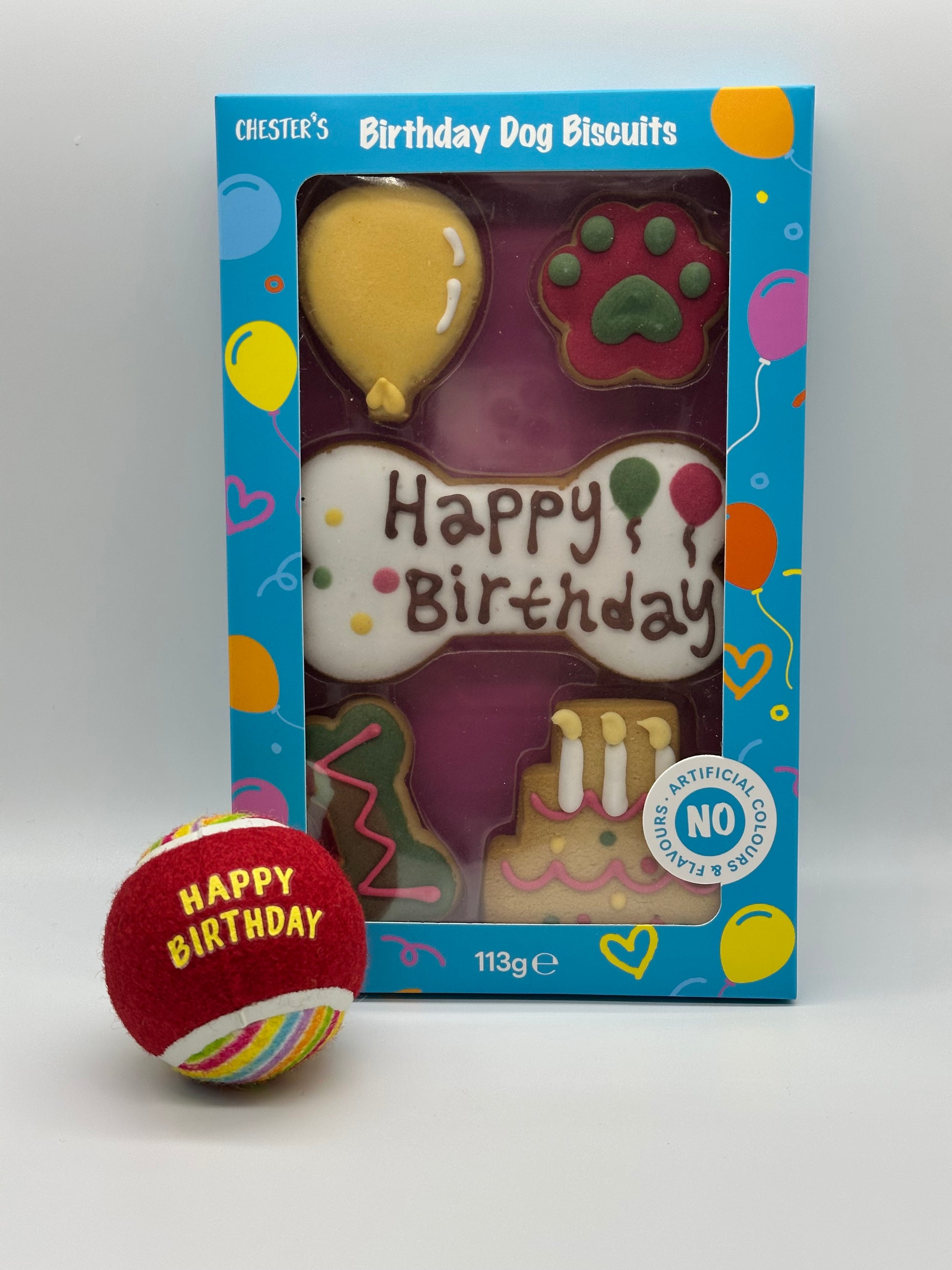 Dog birthday box with birthday biscuits and ball